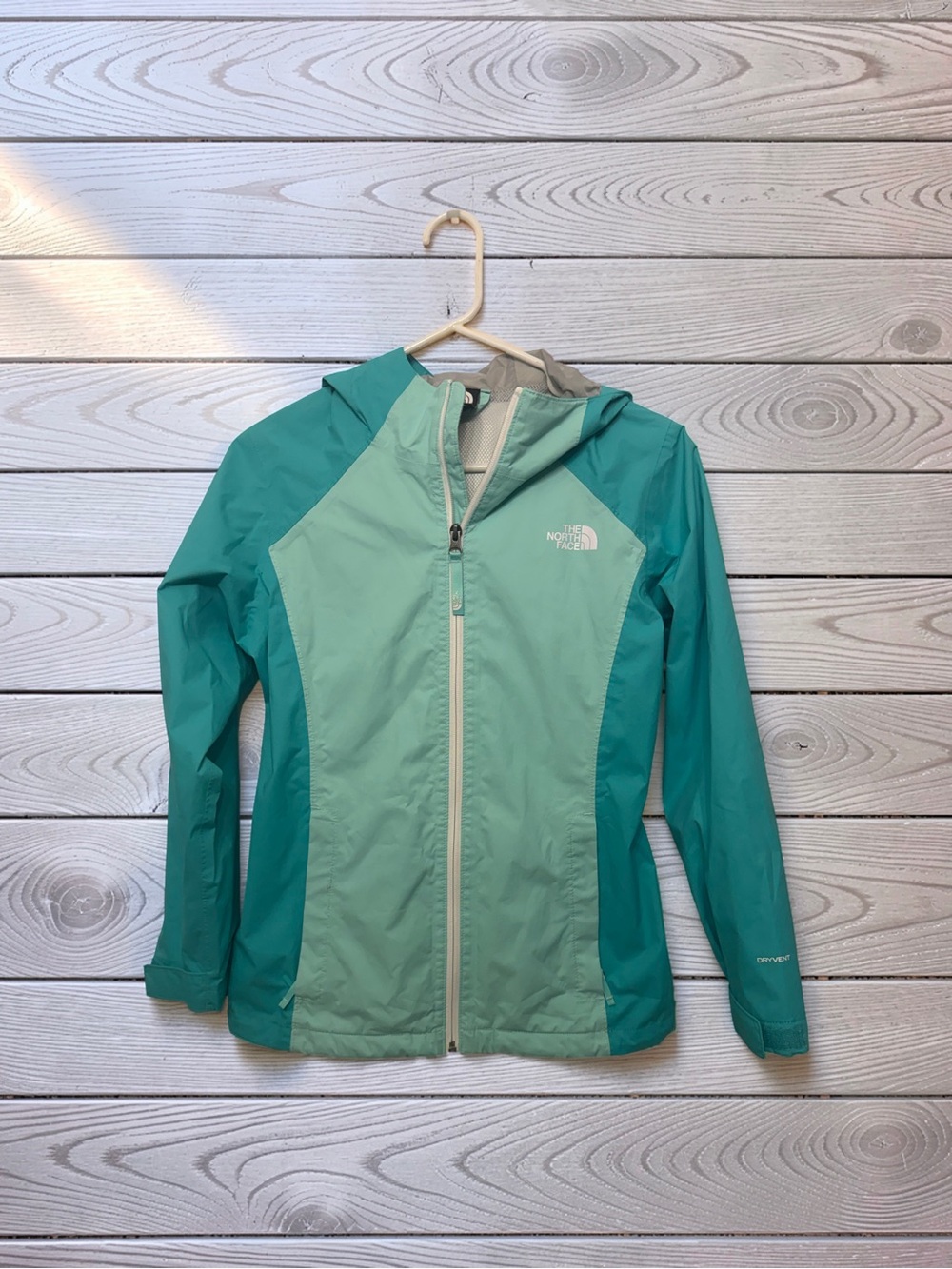 The North Face Girls Teal and Mint Green DryVent Jacket.